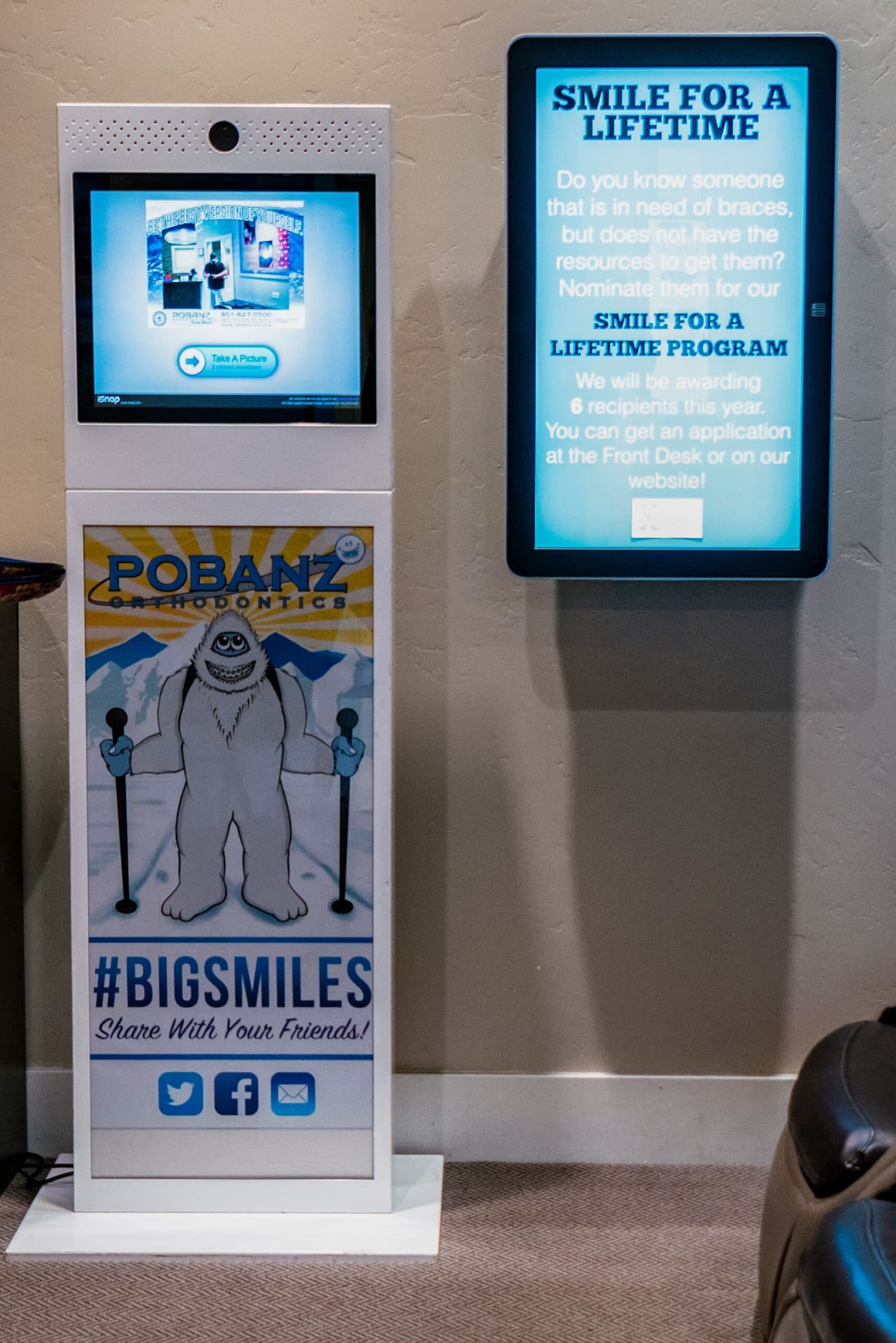 Dental reception area with welcome digital signage