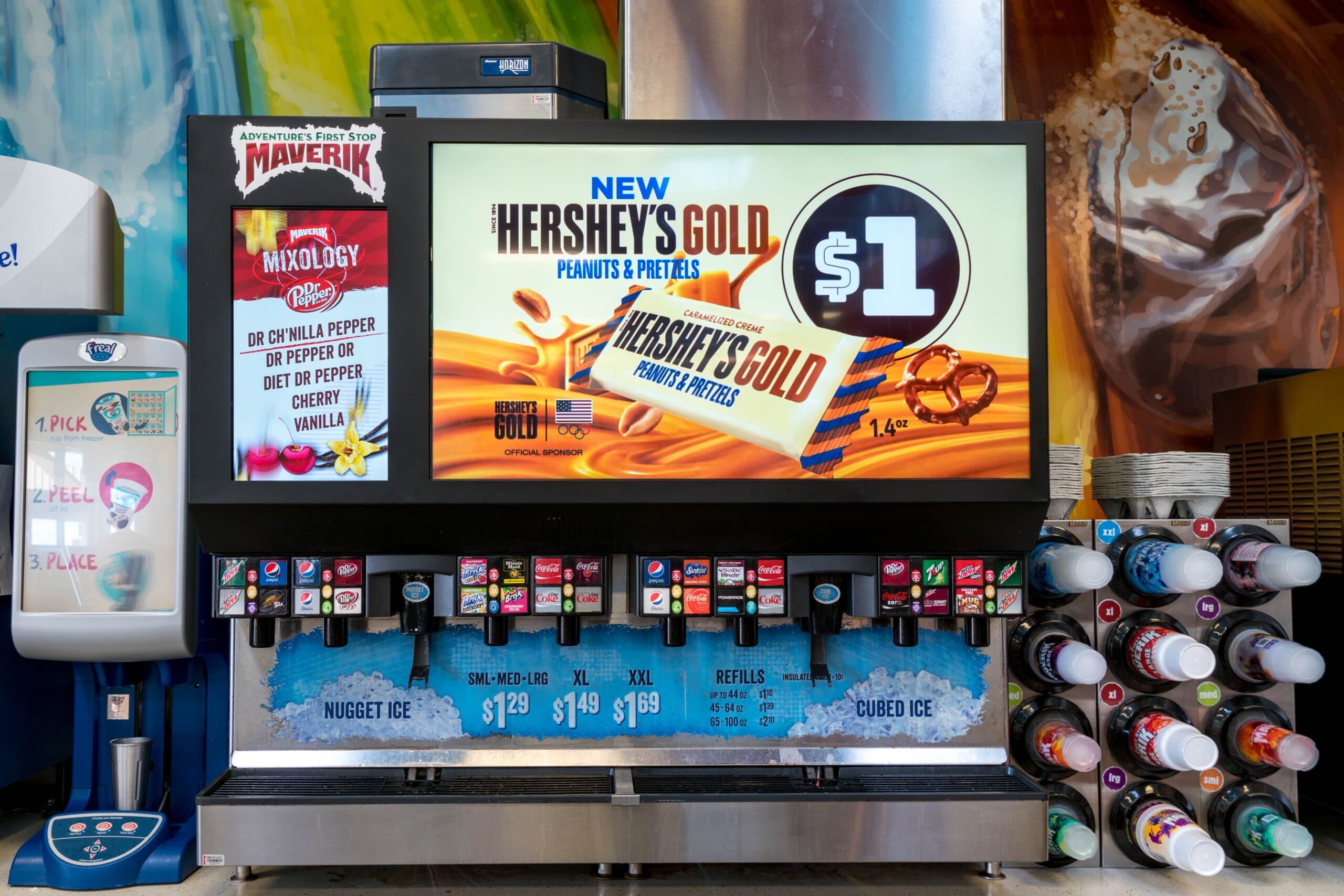 Digital ad content on grocery beverage display