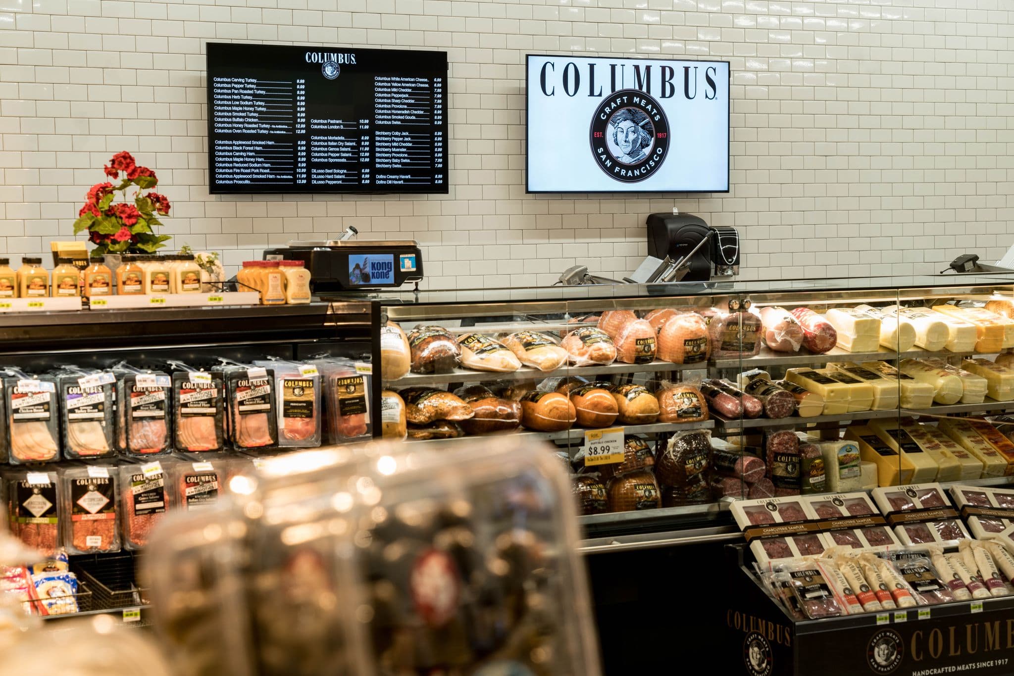 Grocery deli with overhead digital signage