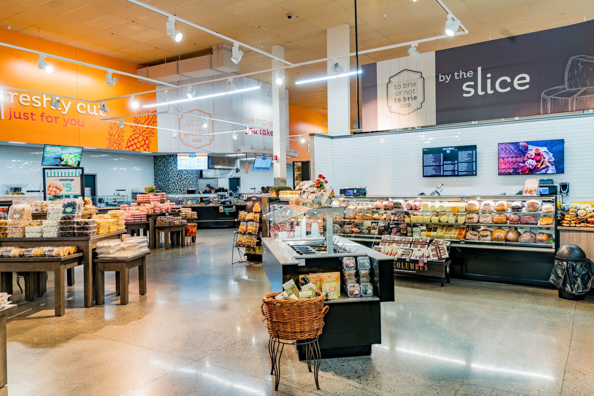 Retail produce area with menu and category signage
