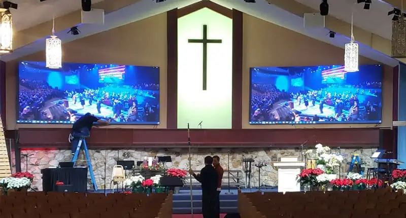 Church sanctuary with large-format message screens