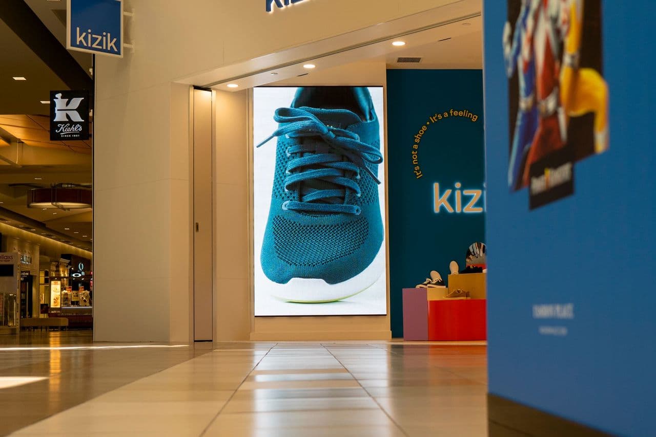 Retail display showcasing lifestyle product visuals